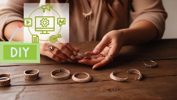 Close-up of a small business owner organizing handcrafted jewelry with overlayed DIY marketing icons, symbolizing cost-effective marketing strategies.